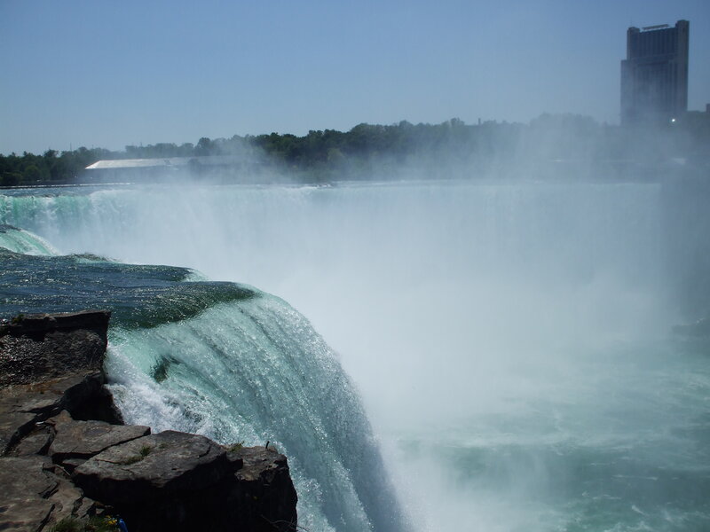 Niagara Falls Waterfall — Blue, Dramatic, Afternoon, Photograph, Trees, Building