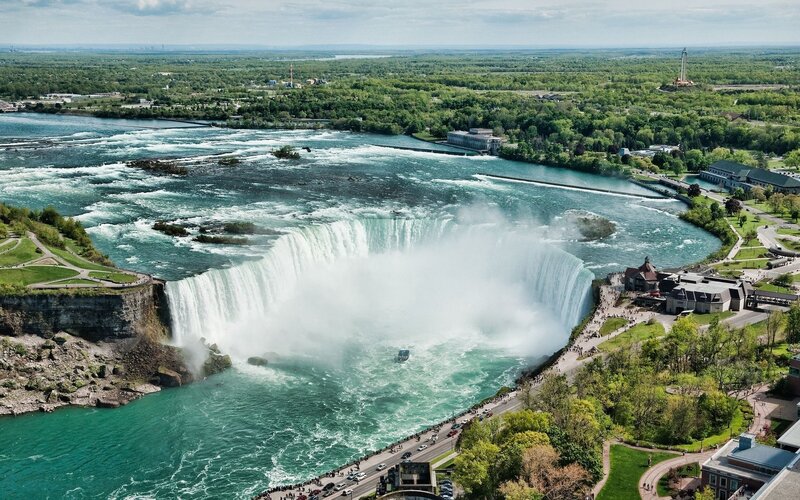 Niagara Falls Waterfall — Green, Dramatic, Afternoon, Photograph, River, Trees, Buildings