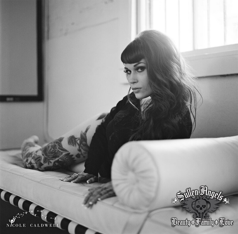 Nicole Caldwell on a chaise lounge