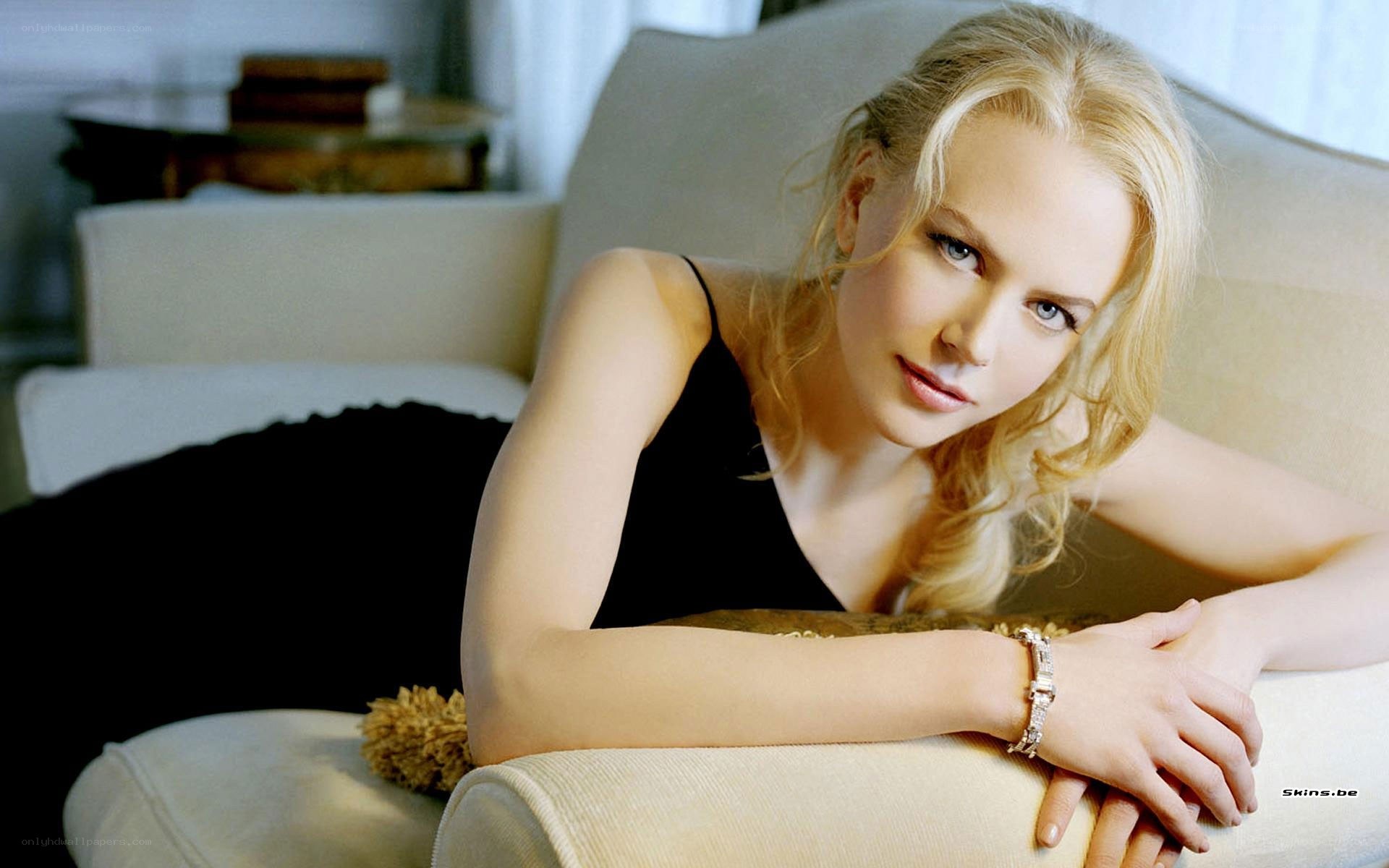 Nicole Kidman on a sofa