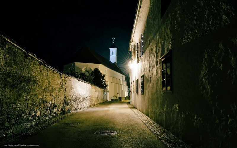 night alley with church tower
