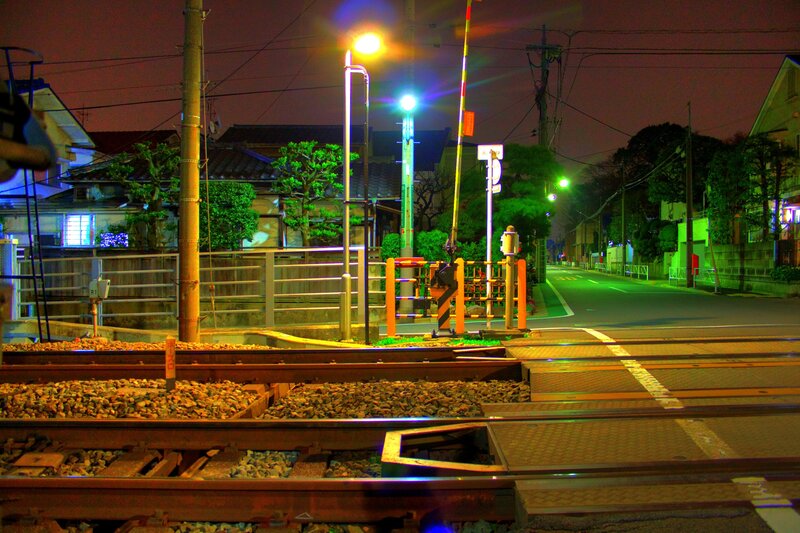Night at a Japanese railway crossing