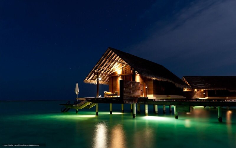 Night at a tropical overwater bungalow