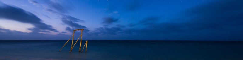 Night at the beach with wooden structure