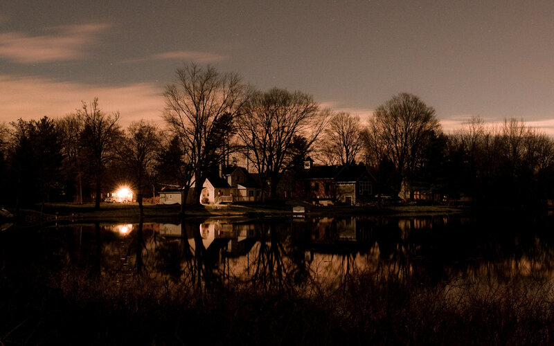 Night by the lake with houses