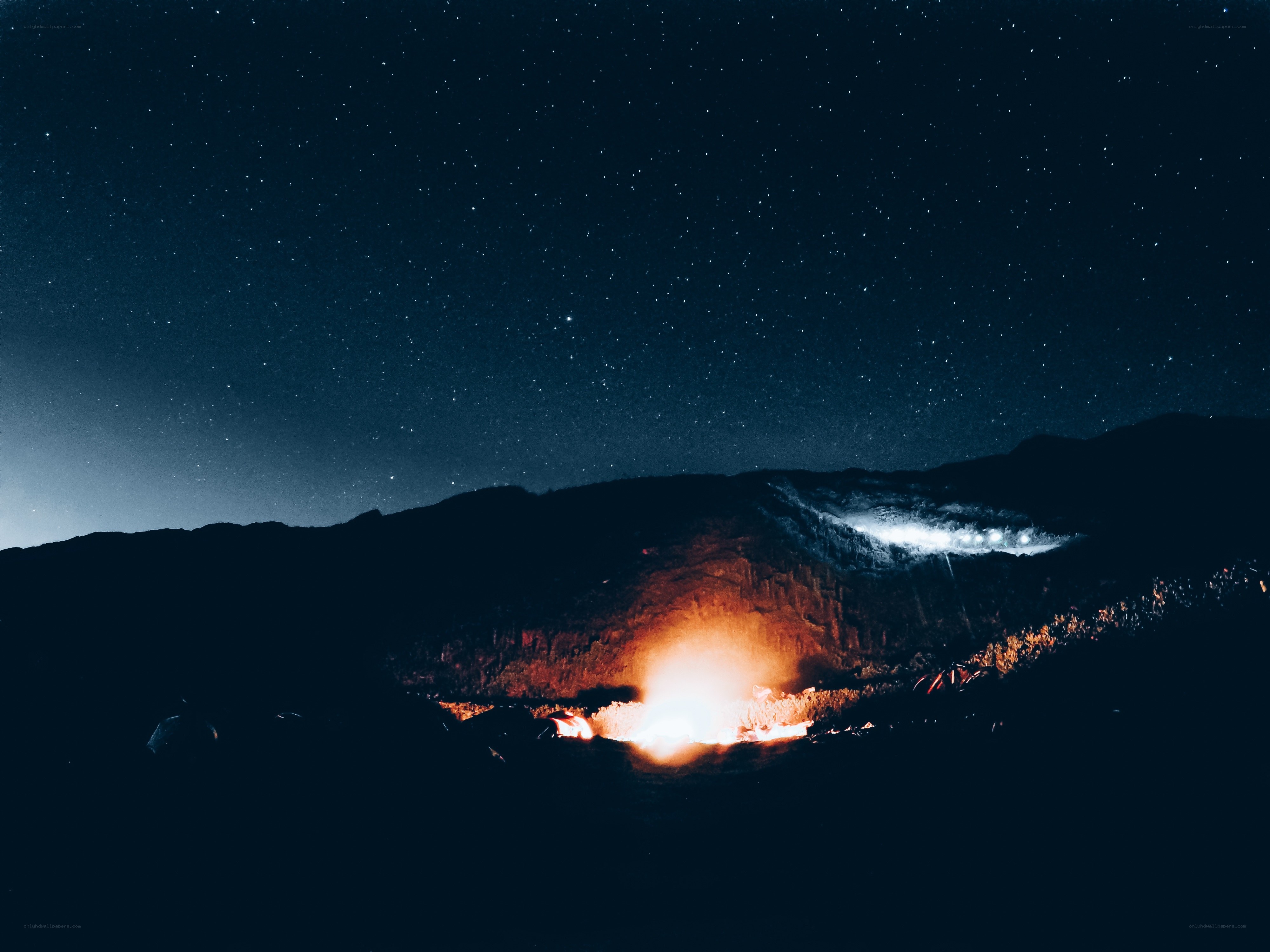 Night campfire under stars