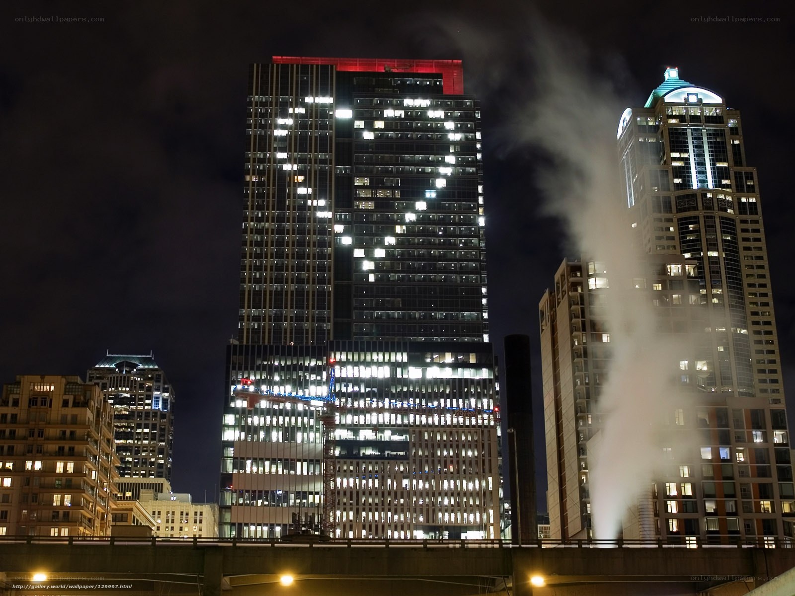 Night city skyline with steam
