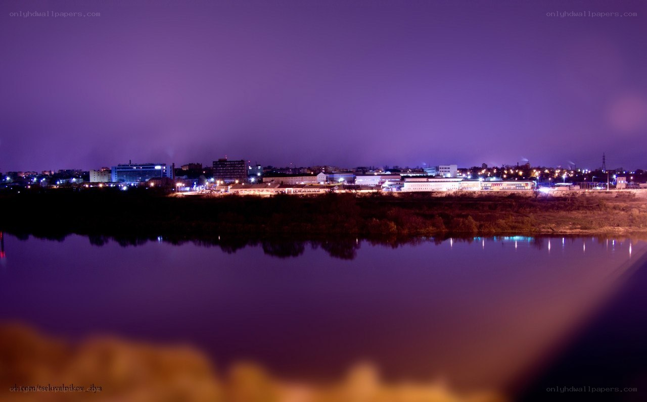 night cityscape by the river