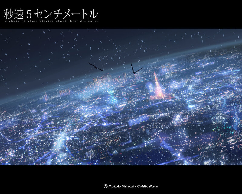 Night cityscape with falling snow