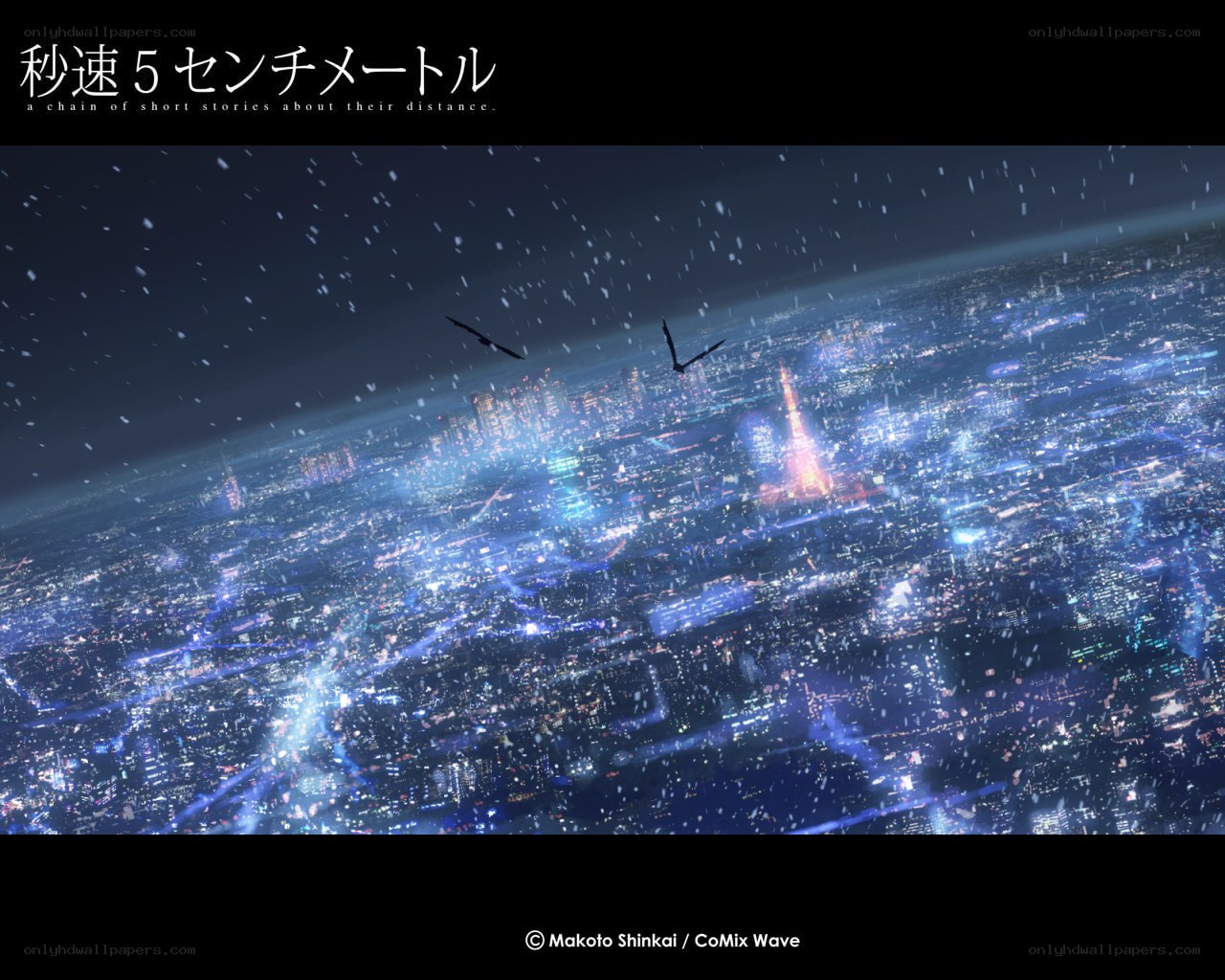 Night cityscape with falling snow