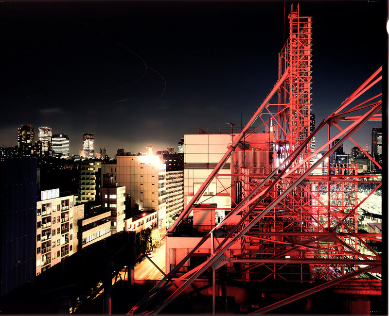 Night cityscape with red structure