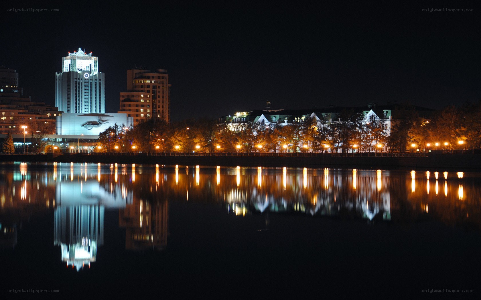 night cityscape with river reflection