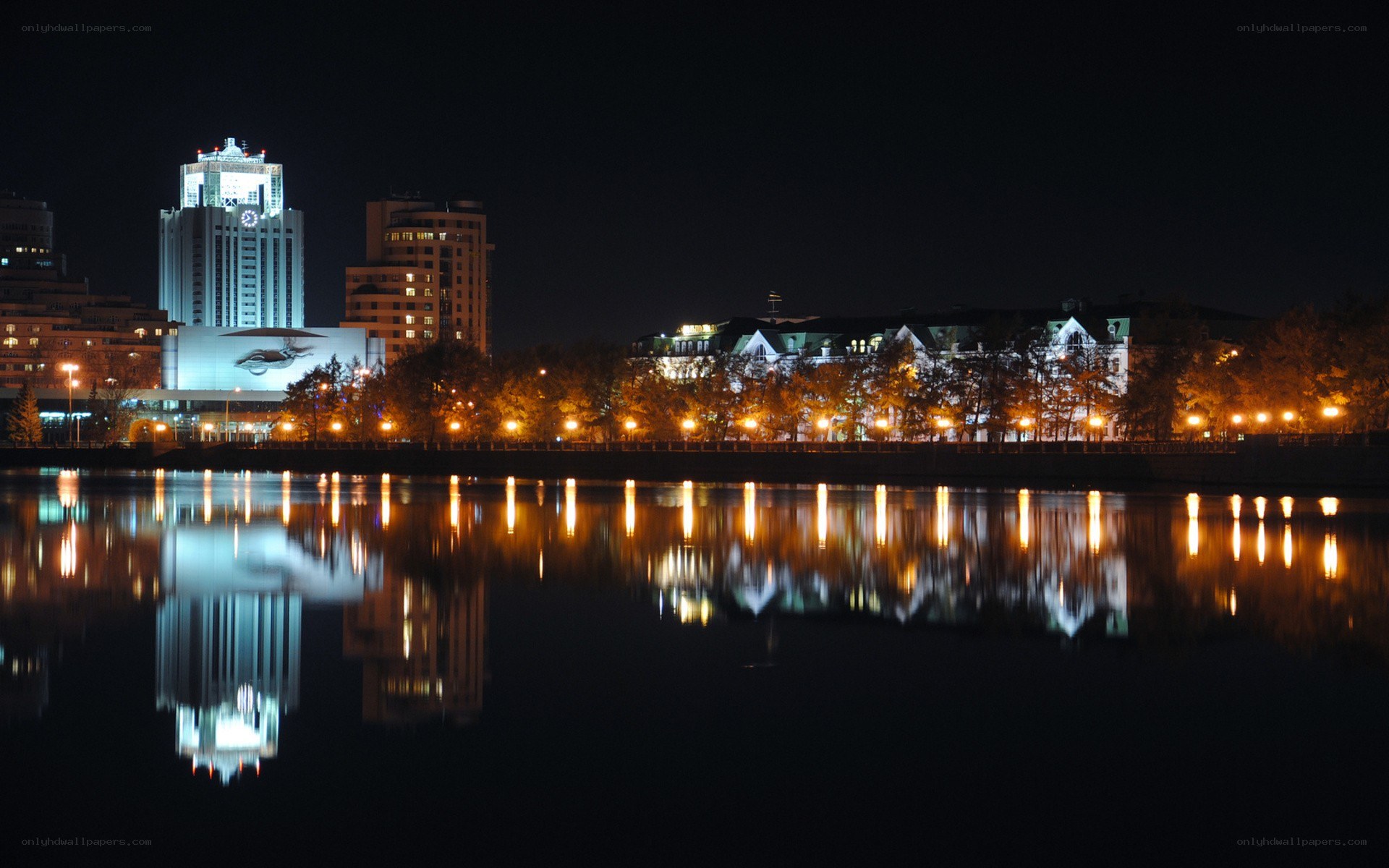 night cityscape with river reflection