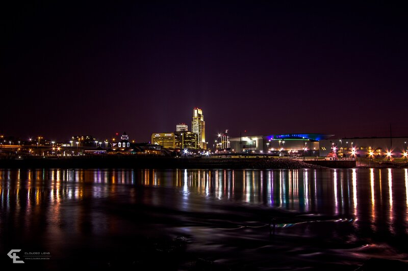 Night cityscape with river reflections