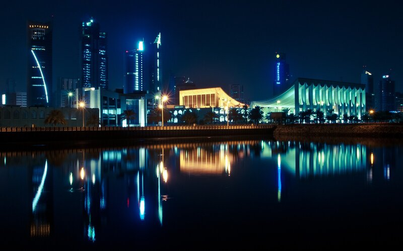 Night cityscape with water reflections