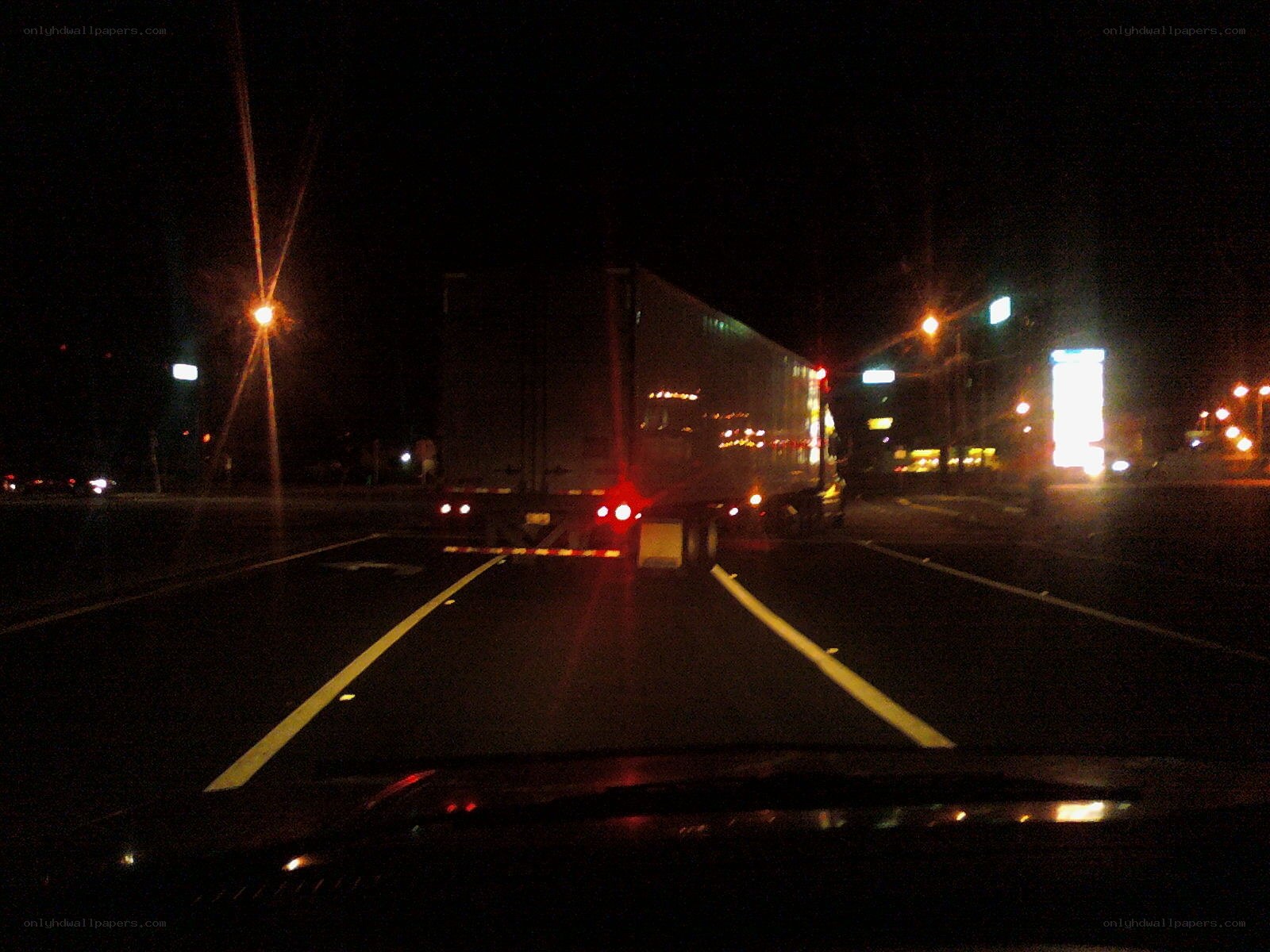 Night drive behind a truck