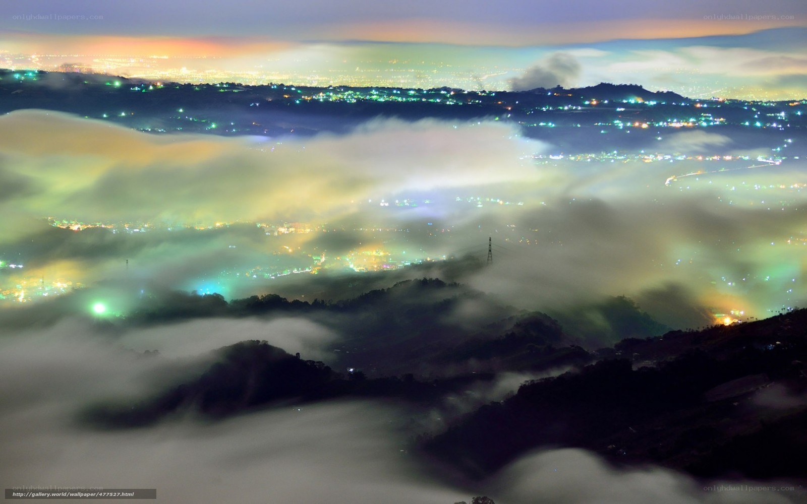 Night fog over city lights