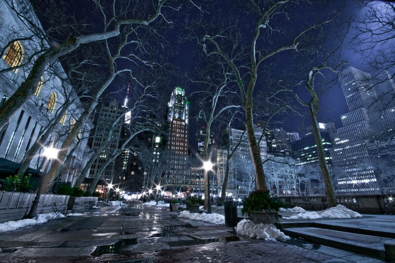 Night in a snowy city park