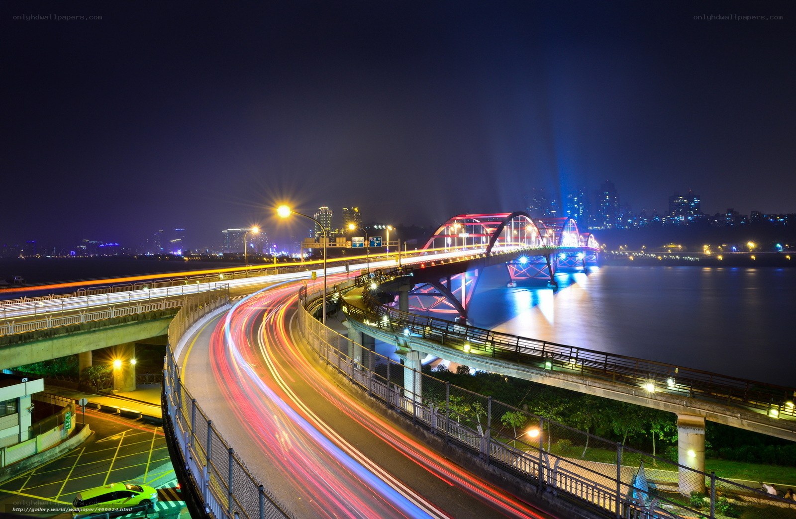 Night lights on a city bridge