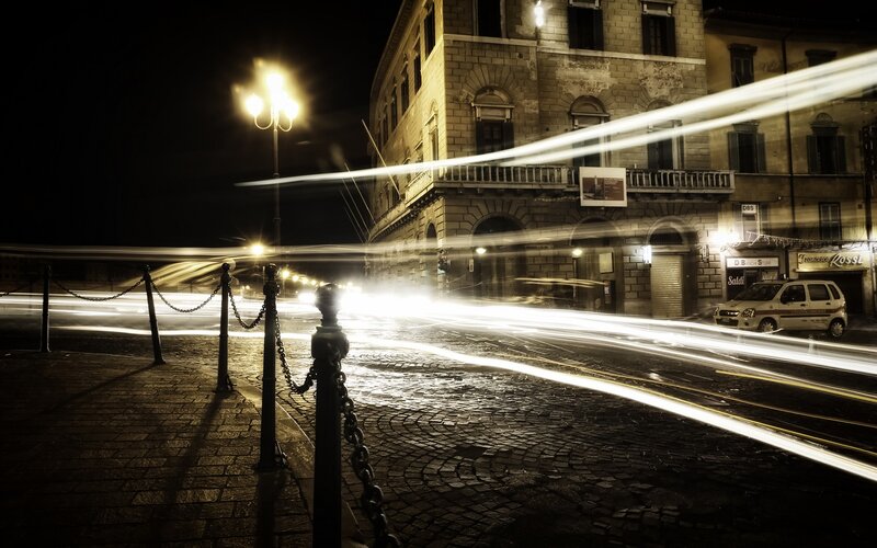 Night lights on a cobblestone street