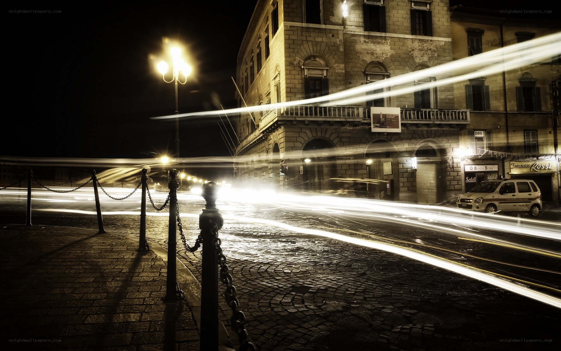 Night lights on a cobblestone street