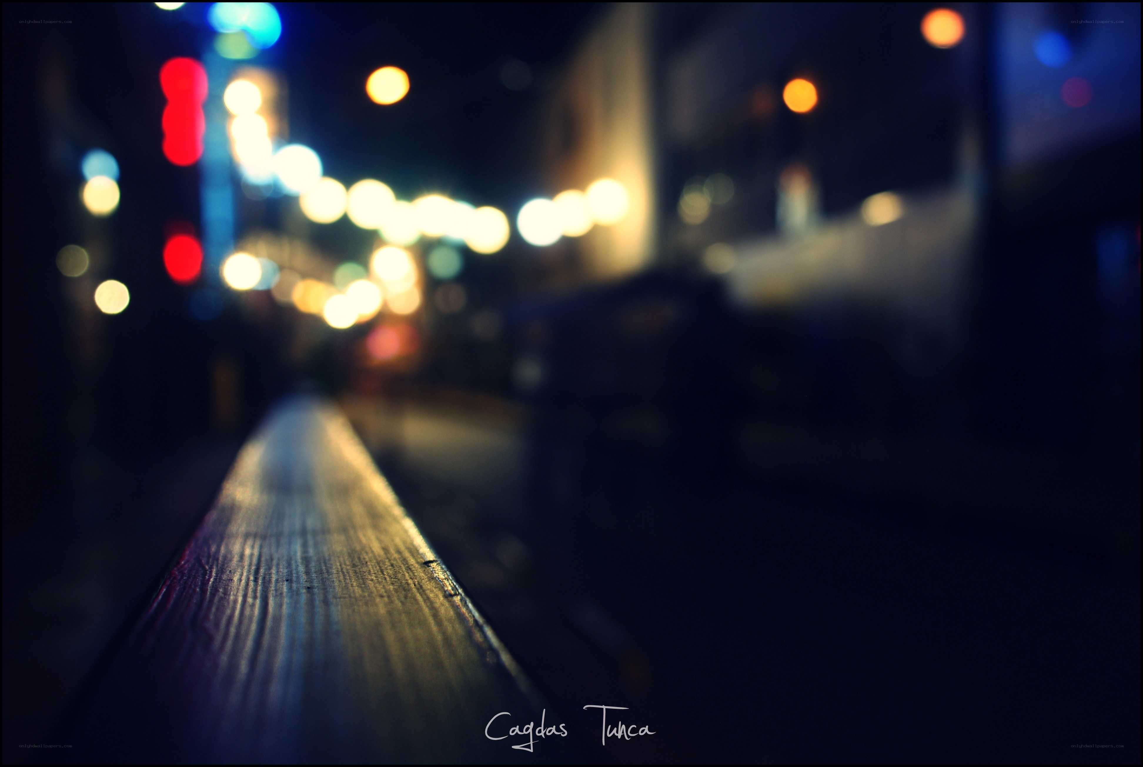 Night lights on a wooden bench