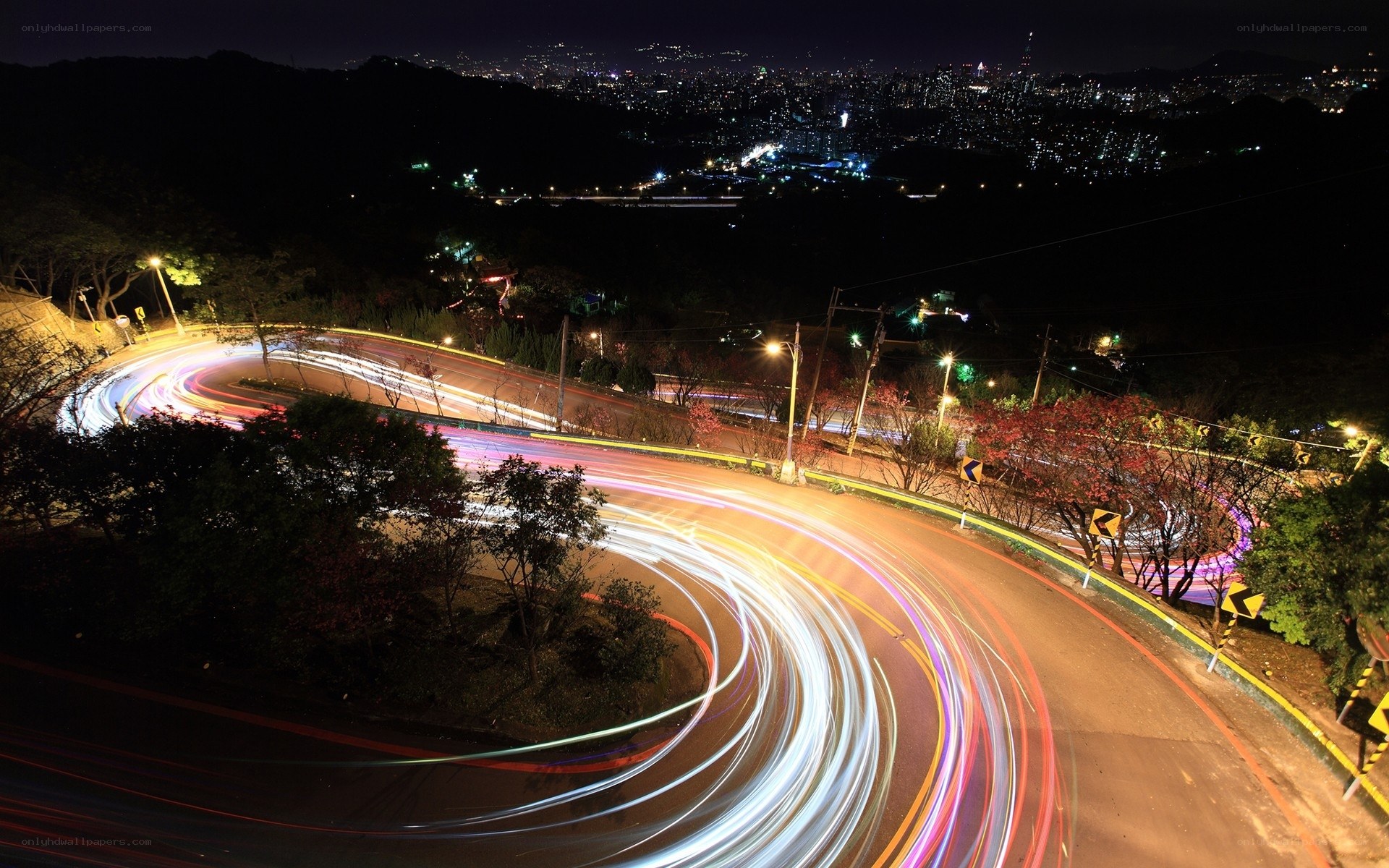 Night lights on winding road