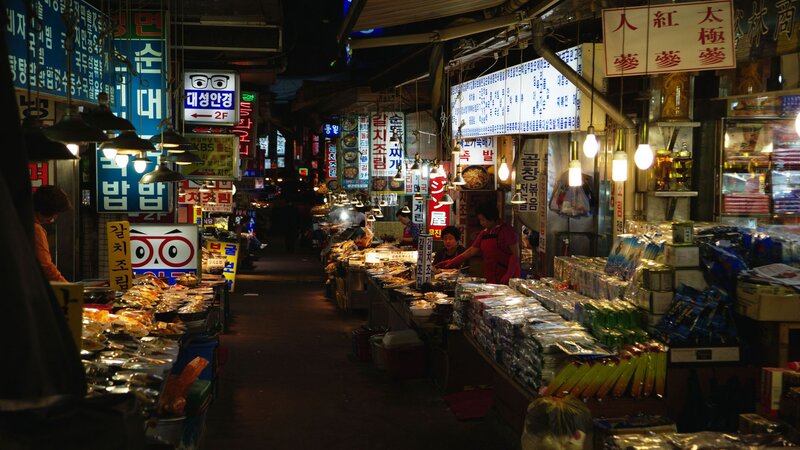night market alley with food stalls