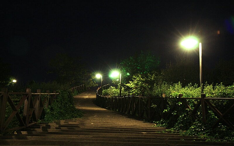 Night path with green lights