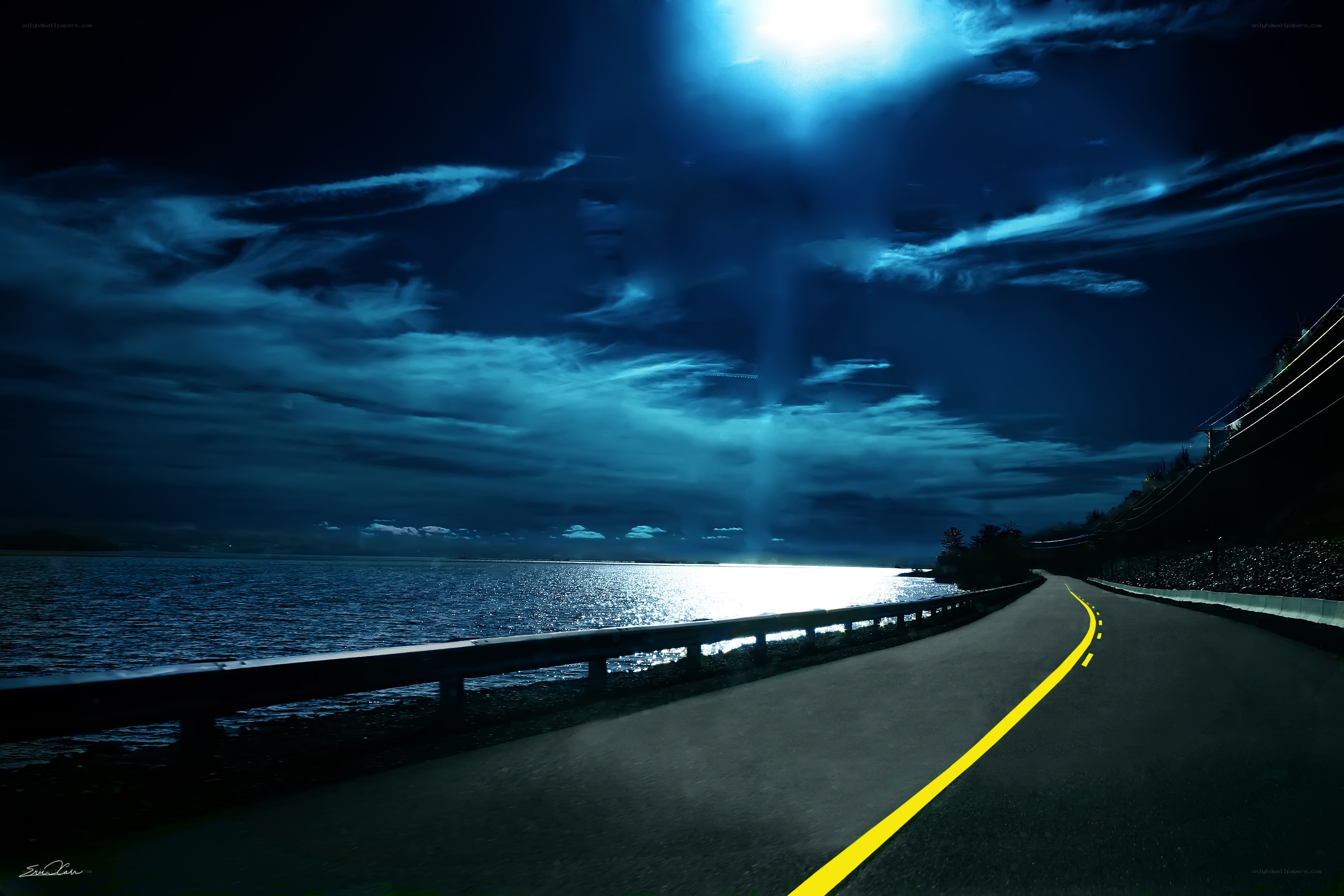 Night road by the water