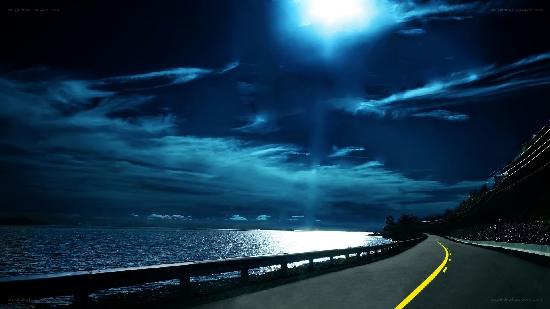 Night road by the water