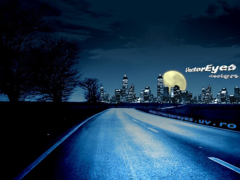 Night road to city skyline