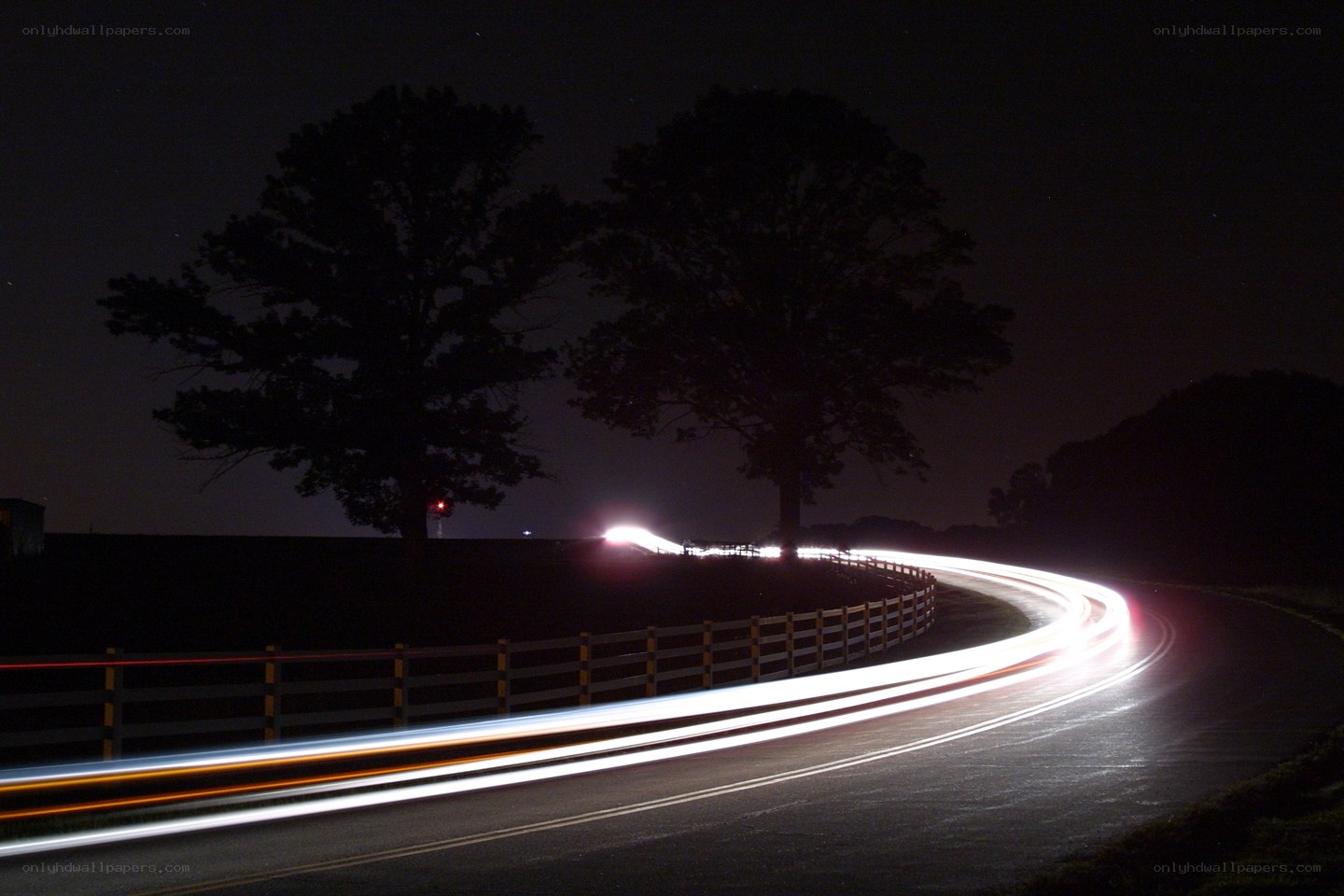 Night road with light trails