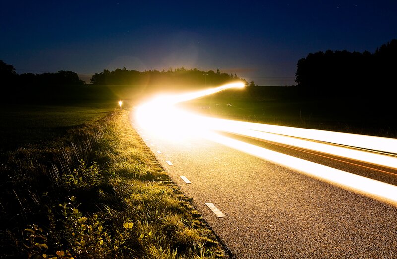 Night road with light trails