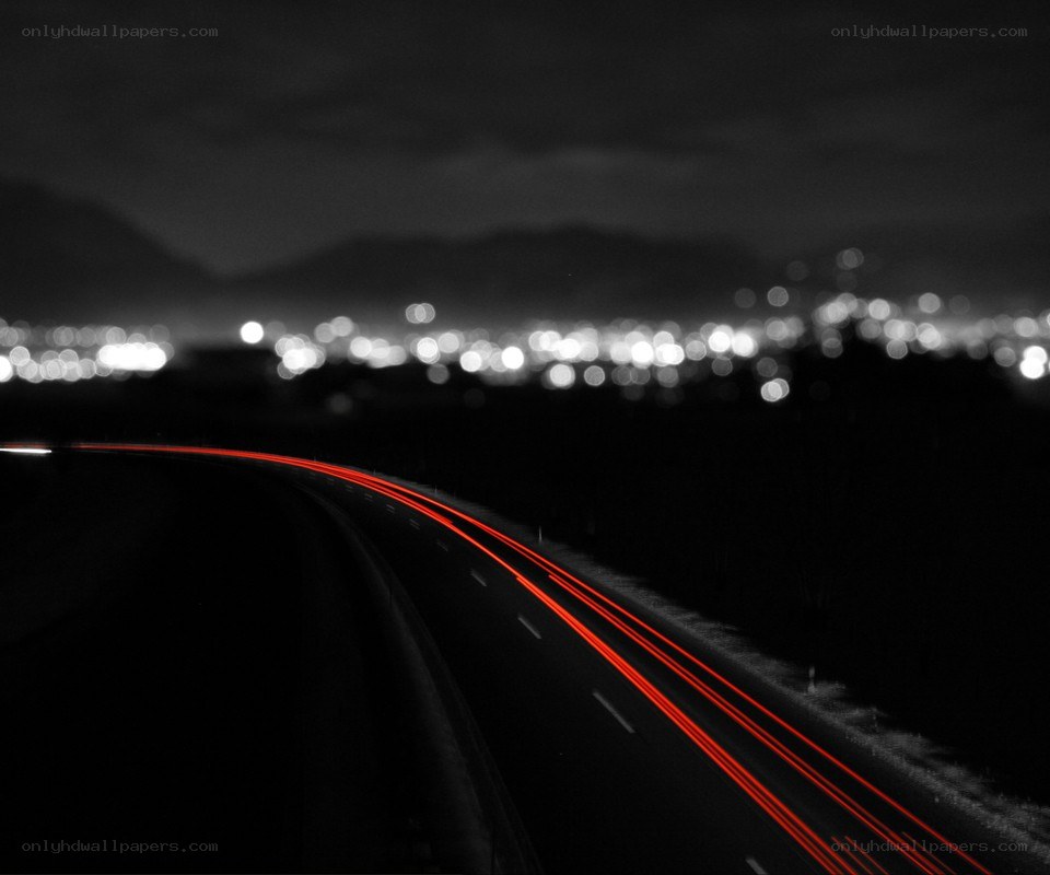 Night road with light trails