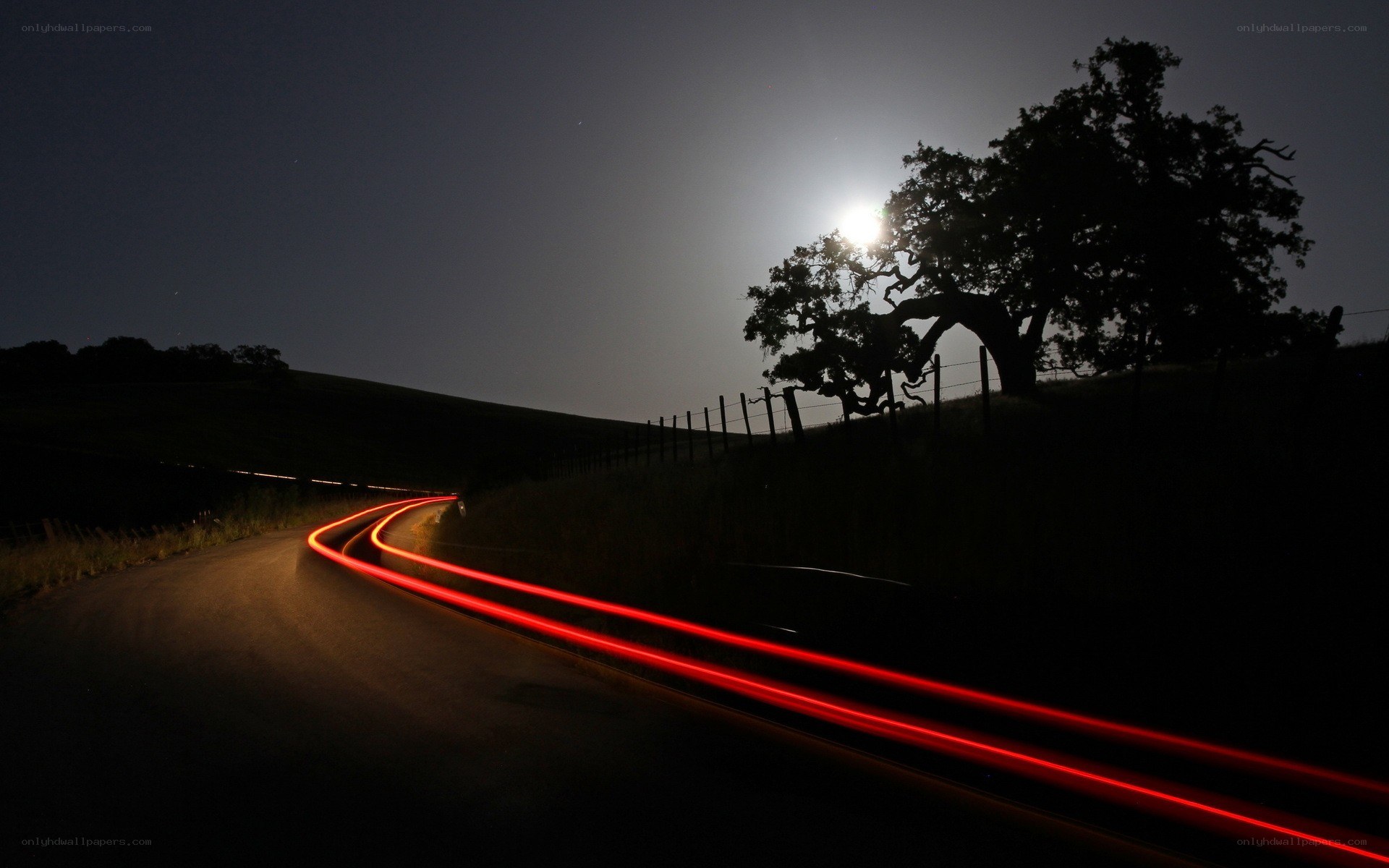 Night road with light trails