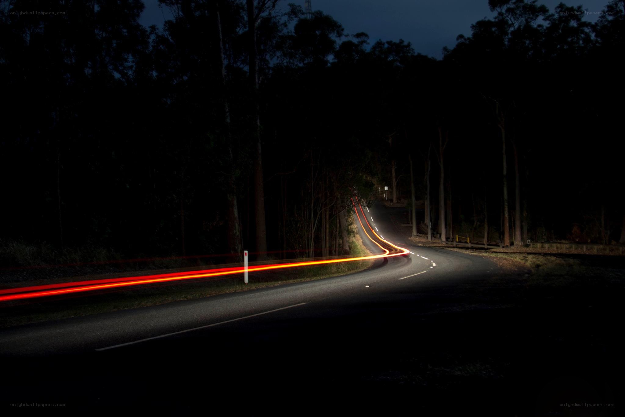Night road with light trails