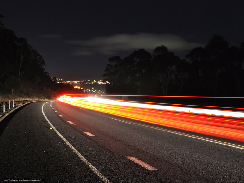 Night road with light trails