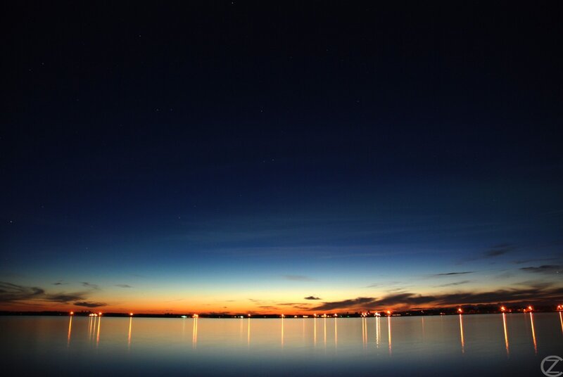 Night sky over a calm lake