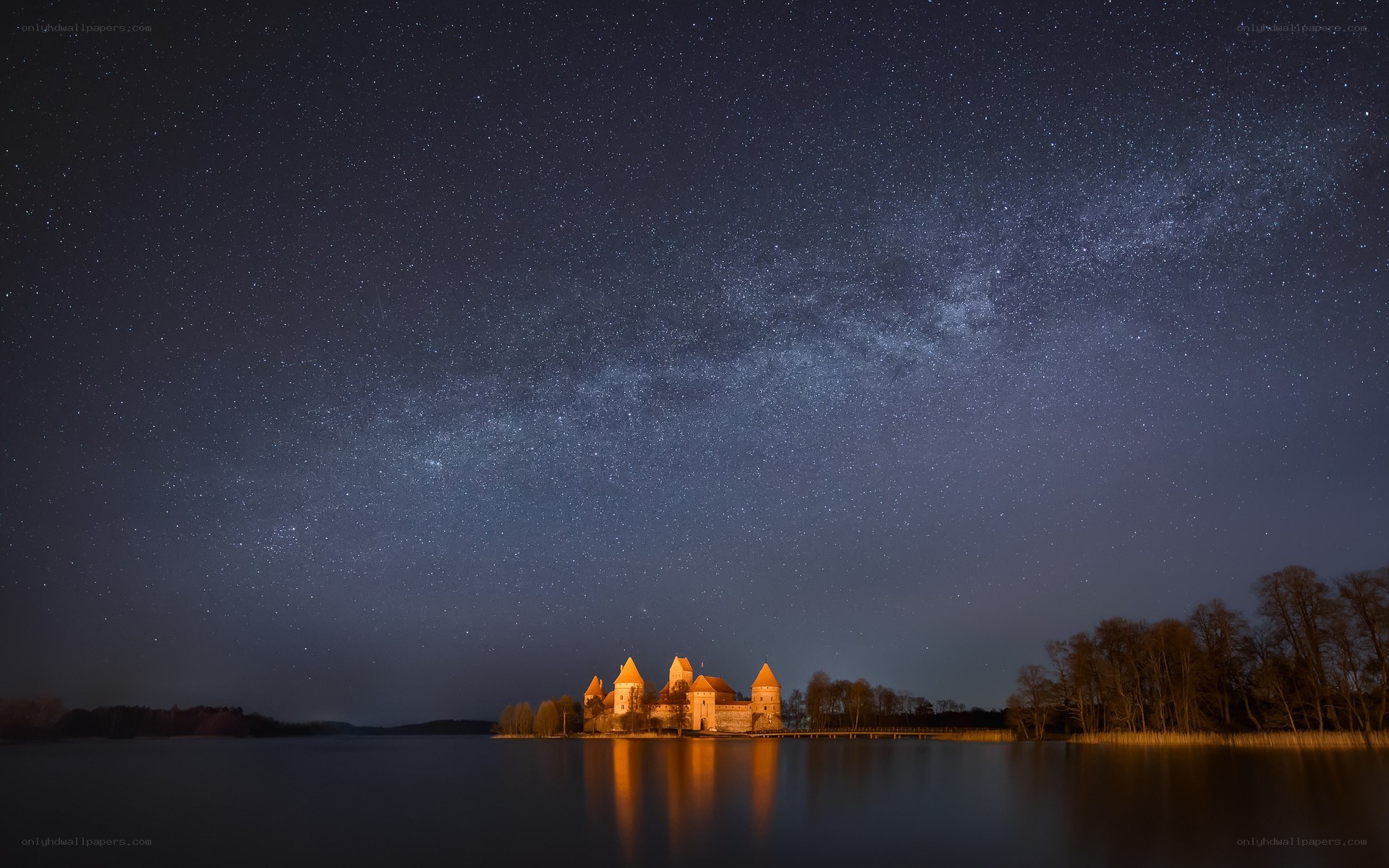 Night sky over a castle