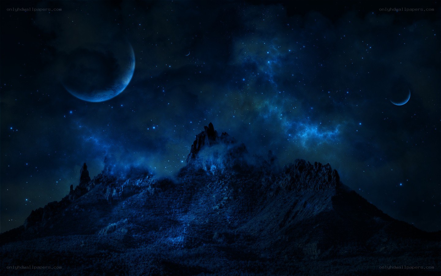 Night sky over alien mountains