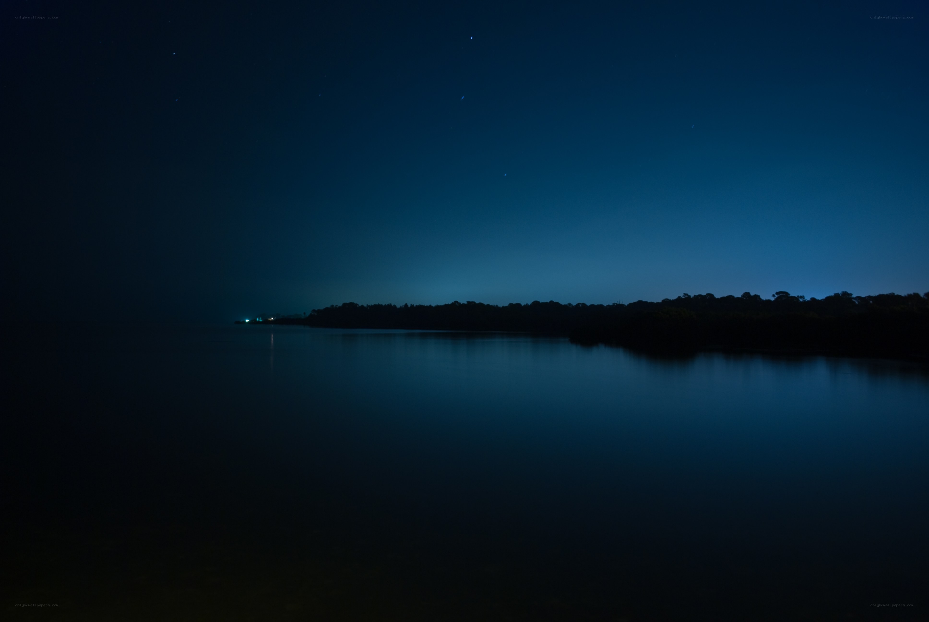night sky over calm water