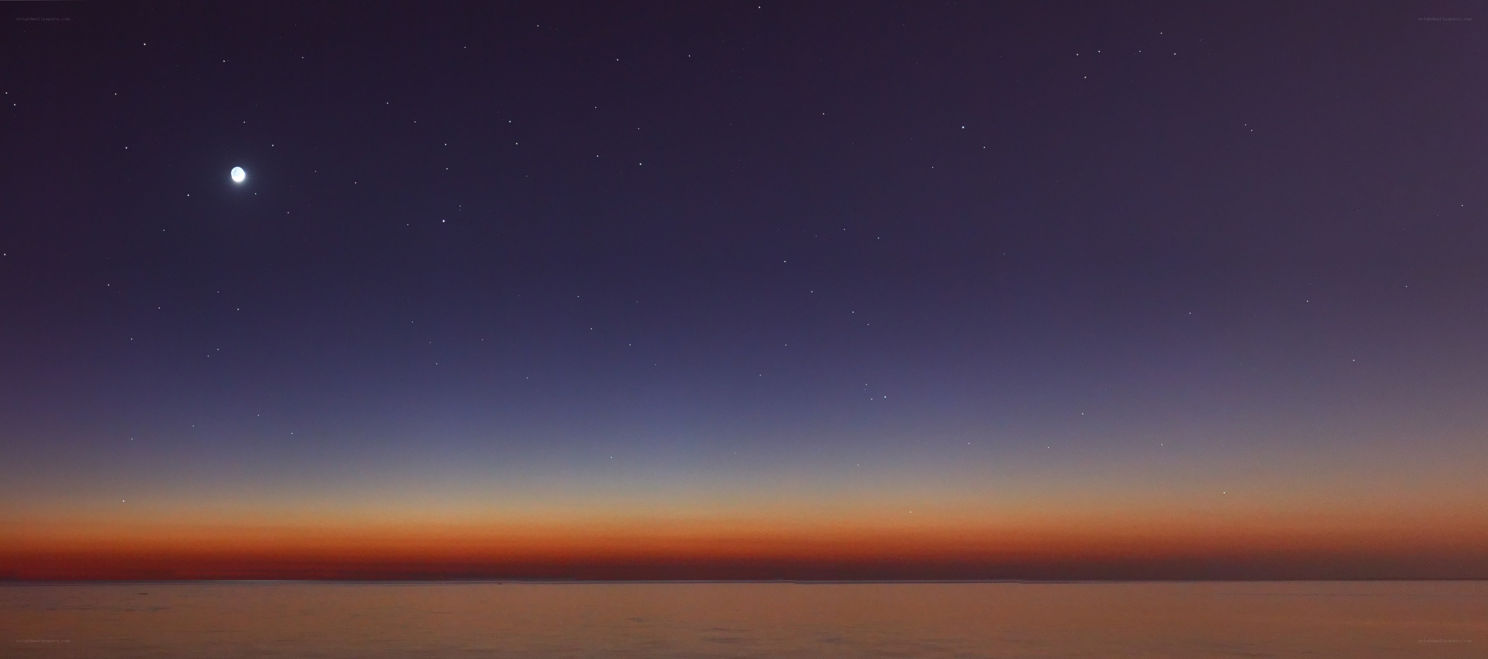 Night sky over calm water