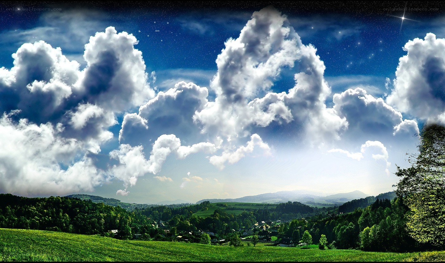 night sky over green valley