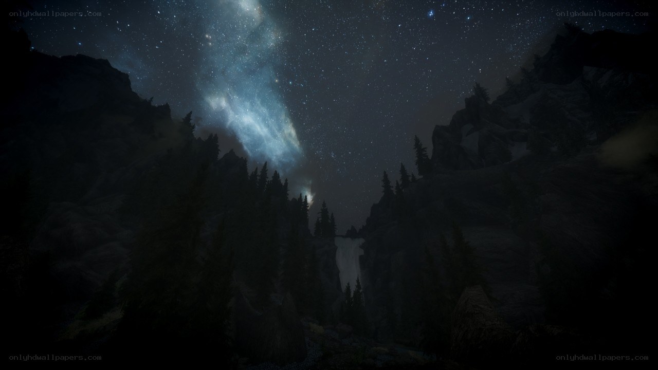 night sky over mountain valley