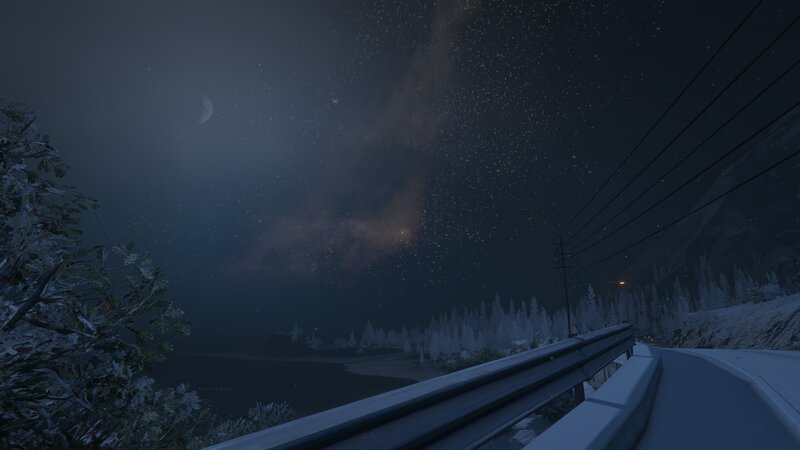 Night Sky over Snowy Road