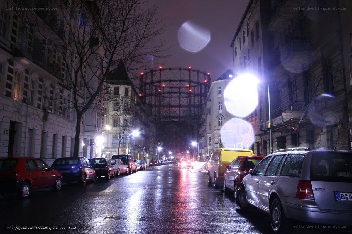 Night street with gasometer