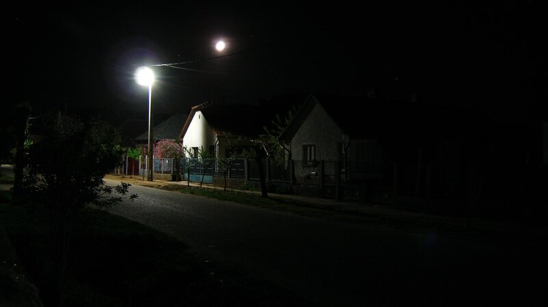 Night street with moon and lamp