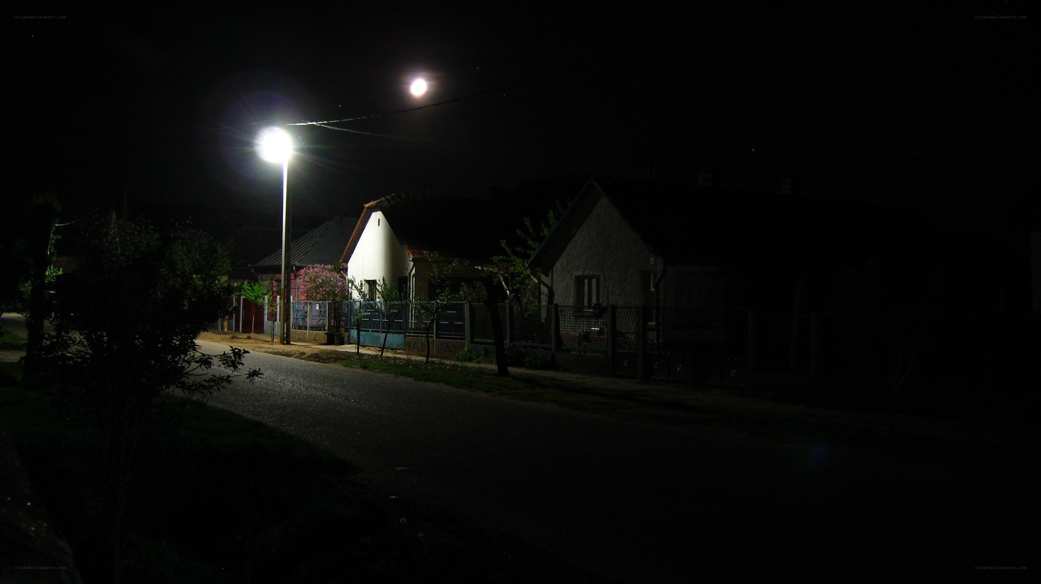 Night street with moon and lamp