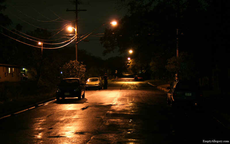 Night street with parked cars